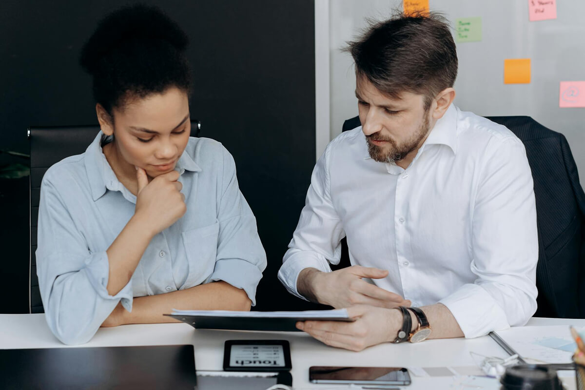 Advisor discussing private health insurance options with a client