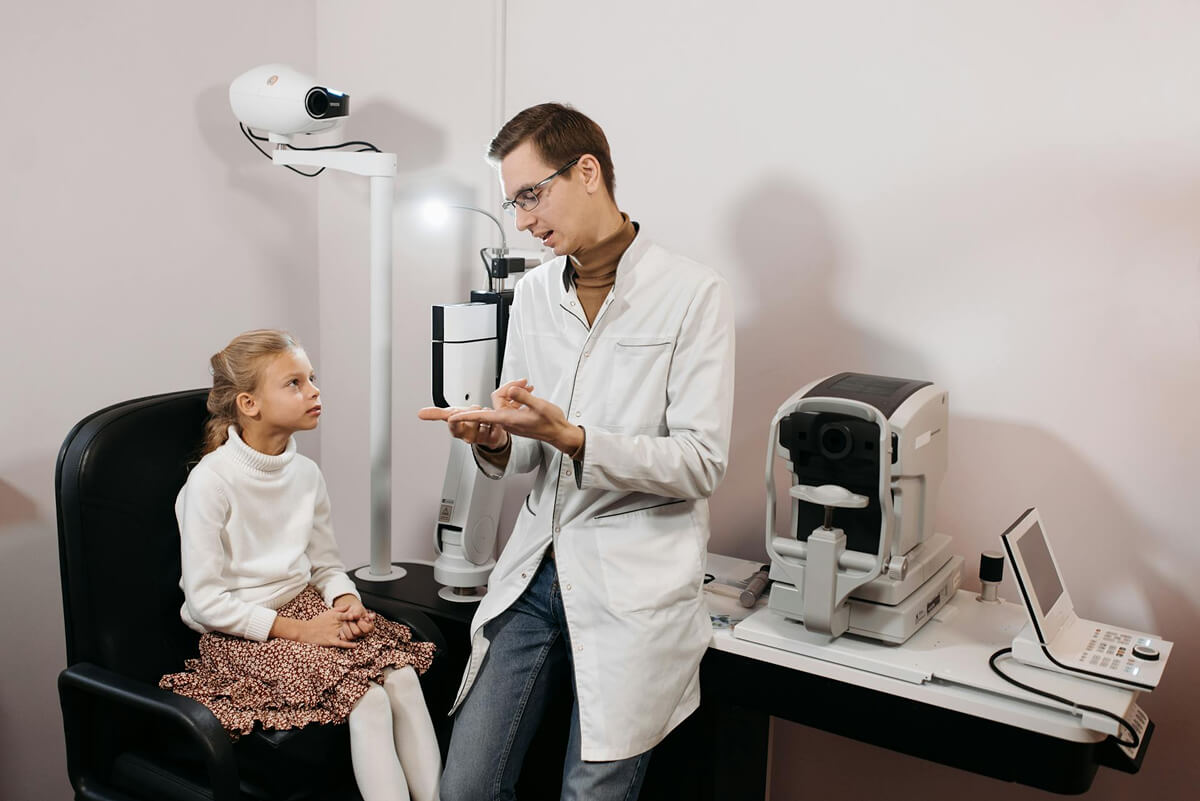 Audiology specialist discussing hearing aid options with a patient